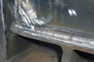 Arc Air Gouging and rewelding of cracked chassis of wheeled excavator